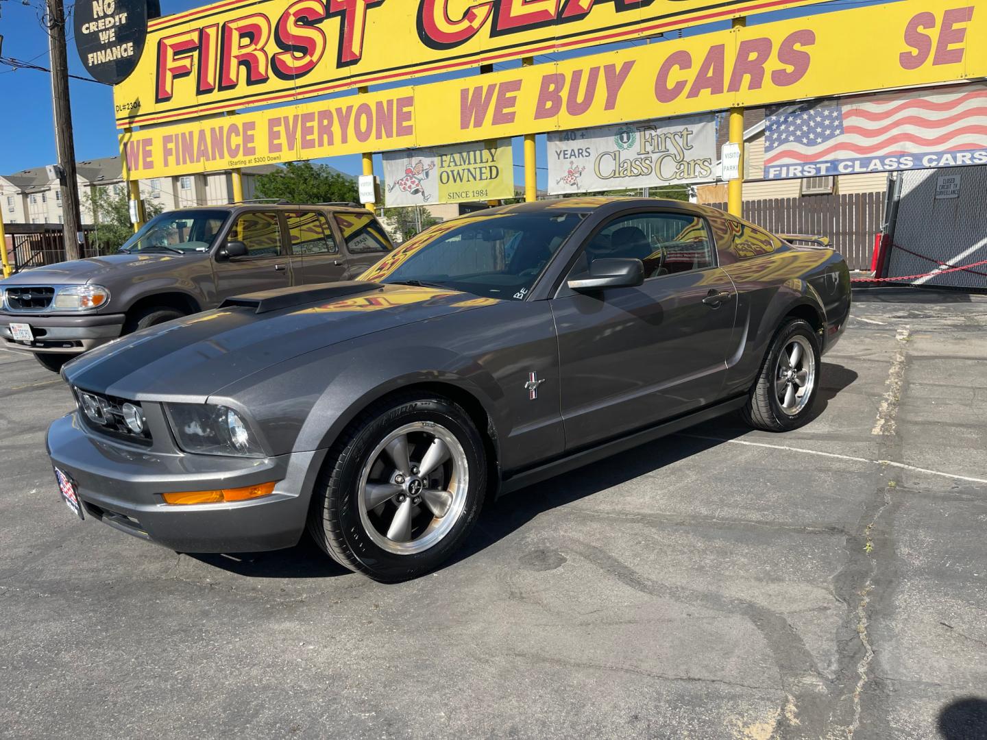 2006 Sterling Gray Metallic /Black Ford Mustang (1ZVFT80N865) with an 4.0 V6 engine, Manual transmission, located at 801 South State Street, Salt Lake City, UT, 84111, (801) 328-0098, 40.751953, -111.888206 - Features: Alloy Wheels, Bluetooth Technology, Leather Seats, AM/FM Stereo, Cruise Control, Power Seat(s), Rear Spoiler, Air Conditioning, Power Locks, Power Windows, Traction Control, CD Audio, Power Mirrors, Rear Defroster - Photo#0